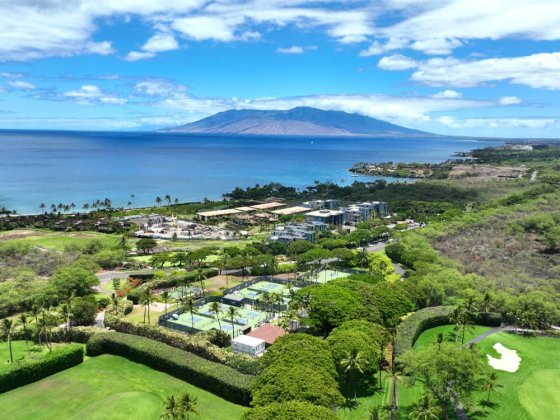 Makena Golf And Beach Club Aerial Photo Shows Tennis Courts, Buildings, Lush Green and Ocean