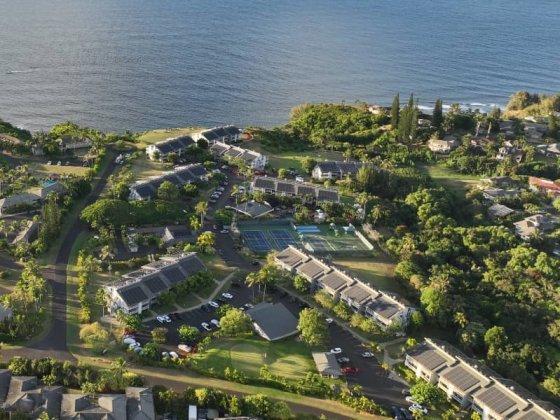 Cliffs At Princeville Aerial Photo With Ocean In Background
