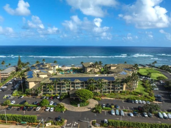 Waipouli Beach Resort In Kapaa Aerial Photo Seen From Inland With Ocean In Distance