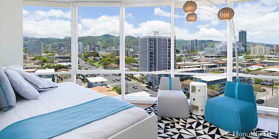 Bright guest bedroom in Moana Pacific #903